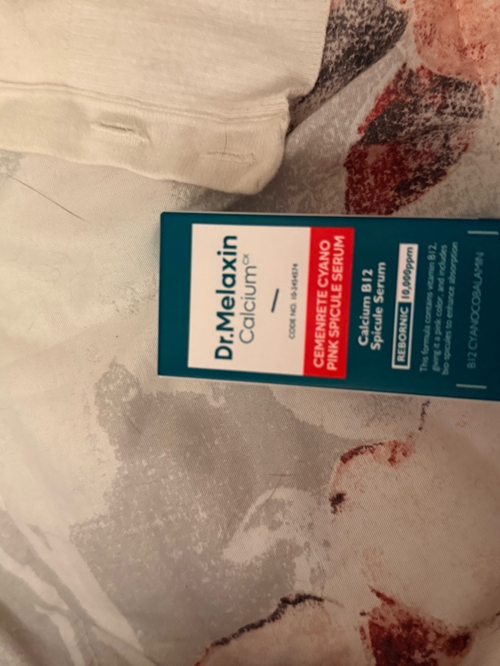 Dr. Melaxin Calcium Pink Spot Serum - Teal & White Packaging